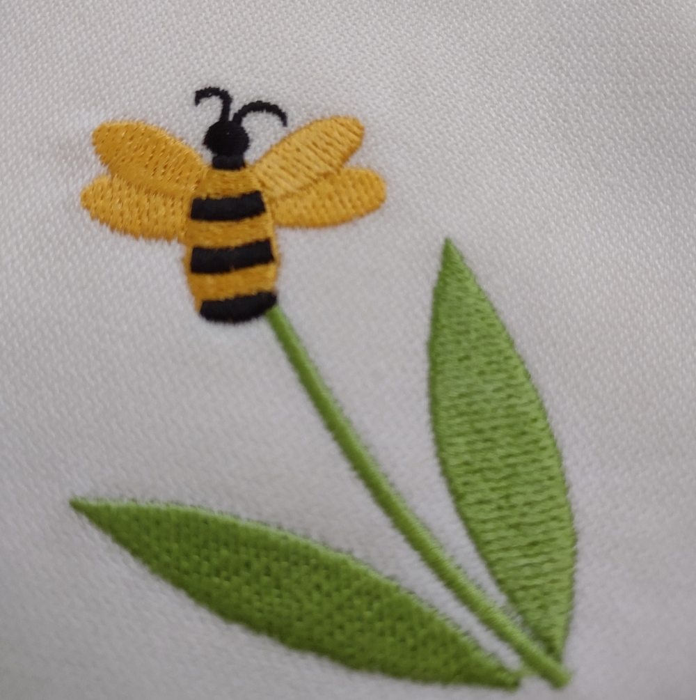 Crate&Barrel White Napkins with Embroidered Bees and Flowers - Picture 3 of 9